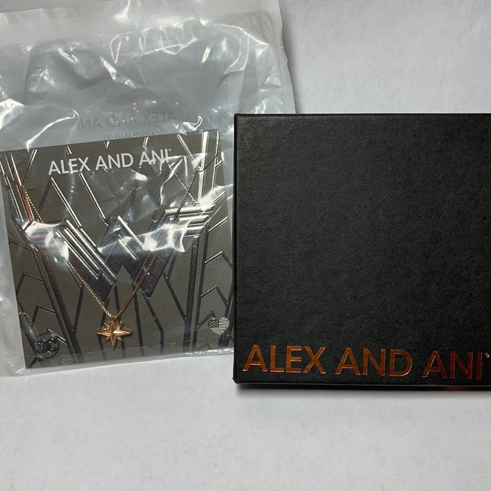 Alex and Ani Wonder Woman necklace in rose gold.